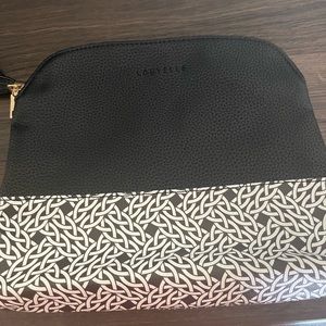 BRAND NEW- never used! LOUVELLE CLUTCH